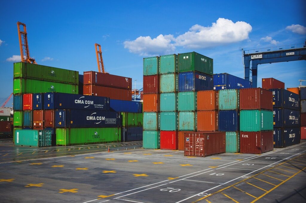 Containers stacked on dock side.