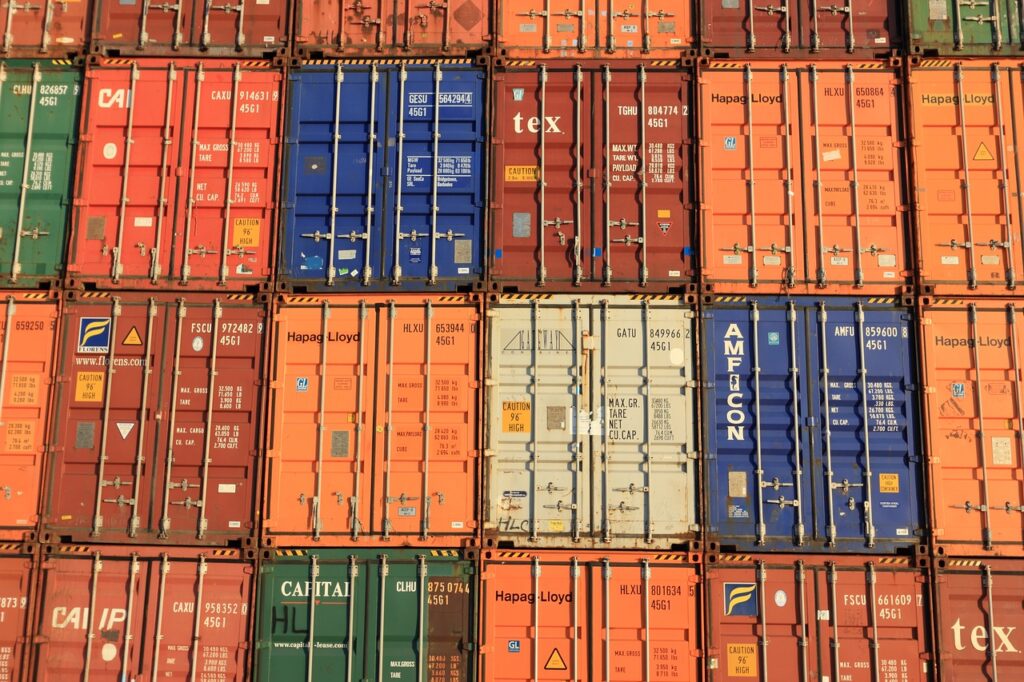 Containers stacked in colour.